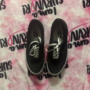 Vans Classic Black and White Low-Top Sneakers